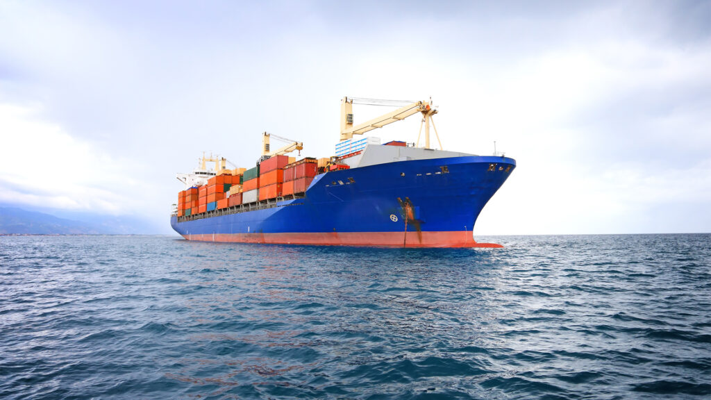 boat with containers in the sea