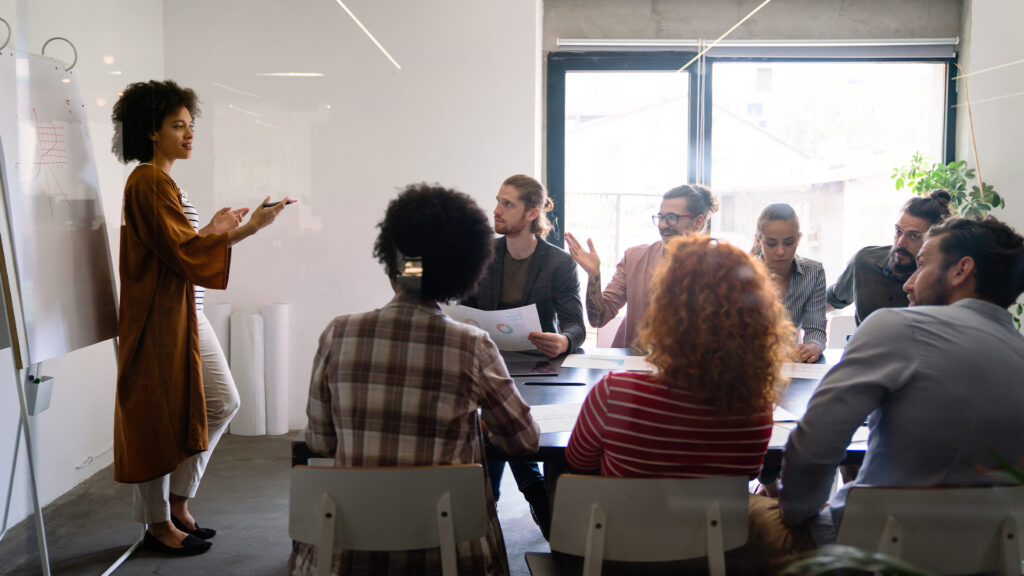 Diverse startup people on meeting having fun during brainstorming new ideas for their new project.