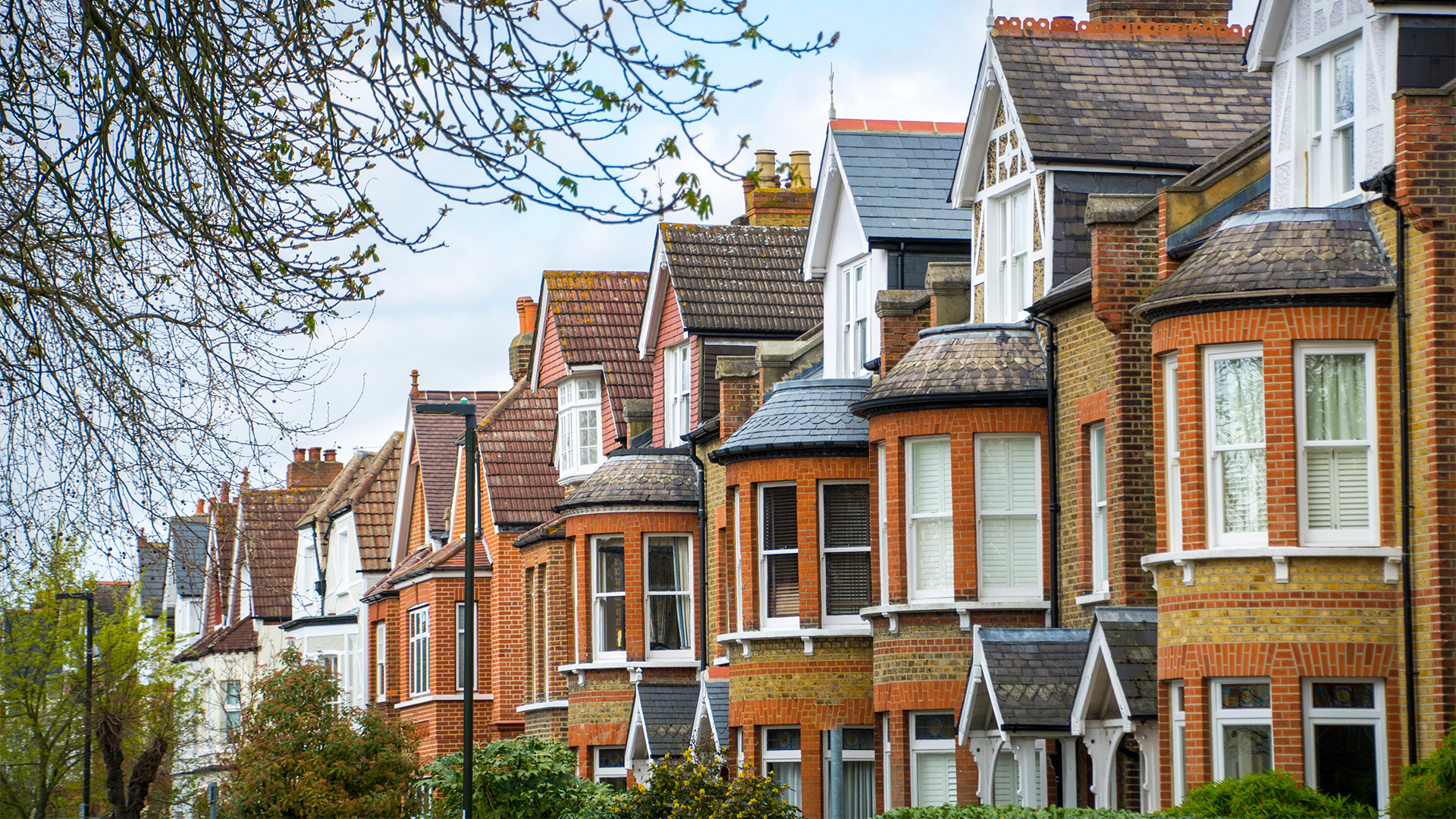 A street of red brick terraced houses