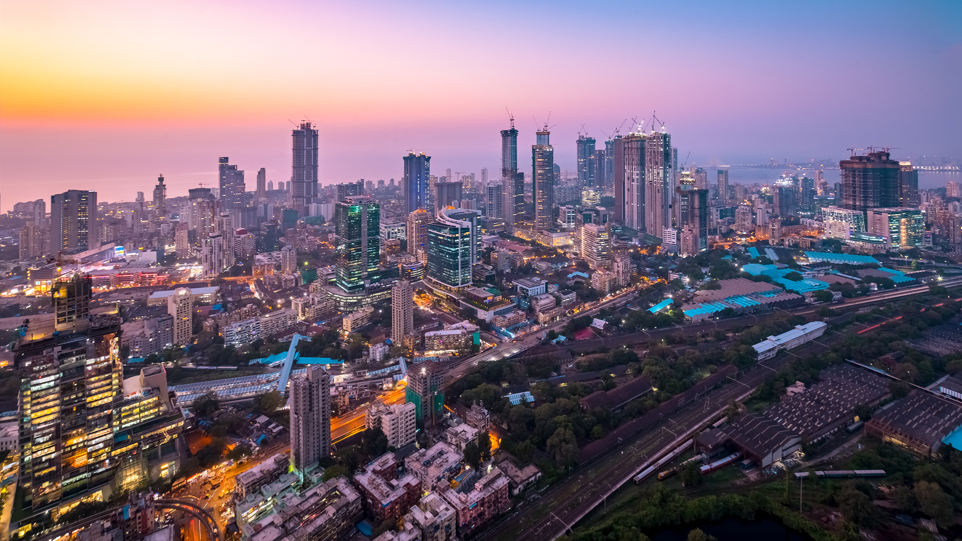 Colourful hues of the sky over the cityscape of Mumbai at dusk, as seen from Currey Road.